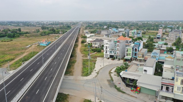 Nhà Bè và Bình Chánh rục rịch lên quận, sóng bất động sản lan rộng sang “vùng trũng giá” - Ảnh 2.